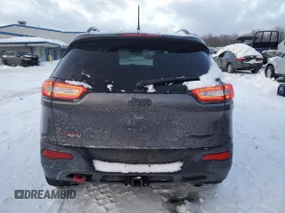 2017 Jeep Cherokee Trailhawk L Plus with VIN 1C4PJMBS2HD228037, listed as a Copart auction lot 41365075 with 84,479 mi miles and Salvage Title. Bid and sale history available at carsss.com. Image 6.