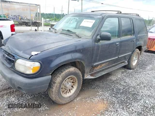 1999 Ford Explorer XL z VIN 1FMDU34X5XUC08663, wystawiony jako IAAI lot #42385444 z przebiegiem 177 387 mil mil oraz . Historia ofert i sprzedaży dostępna na DreamBid. Obrazek 2.