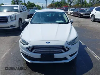 2018 Ford Fusion S z VIN 3FA6P0UU1JR204607, wystawiony jako IAAI lot #41985269 z przebiegiem 116 517 mil mil oraz . Historia ofert i sprzedaży dostępna na DreamBid. Obrazek 12.