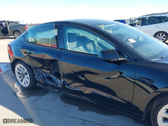 2023 Tesla Model 3 with VIN 5YJ3E1EA4PF552103, listed as a IAAI auction lot 40782218 with 20,997 mi miles. Bid and sale history available at carsss.com. Image 6.