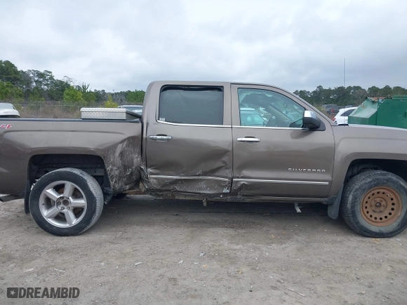 2015 Chevrolet Silverado 1500 LTZ with VIN 3GCUKSEC5FG467252, listed as a IAAI auction lot 41544477 with 144,719 mi miles. Bid and sale history available at carsss.com. Image 13.
