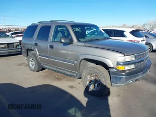 2002 Chevrolet Tahoe Z71 with VIN 1GNEK13Z32R125421, listed as a IAAI auction lot 41859011 with 216,021 mi miles. Bid and sale history available at carsss.com. Image 1.