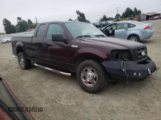 2005 Ford F-150 STX with VIN 1FTRX12W55KB45878, listed as a Copart auction lot 66160994 with 128,212 mi miles and Salvage Title. Bid and sale history available at carsss.com. Image 4.