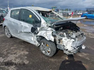 2014 Toyota Yaris L with VIN JTDKTUD33ED582669, listed as a IAAI auction lot 41573696 with 1 mi miles. Bid and sale history available at carsss.com. Image 1.