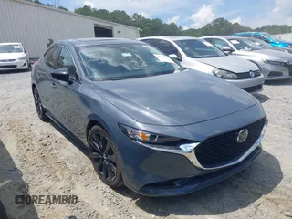 2024 Mazda 3 S Carbon Edition with VIN 3MZBPBCM9RM406901, listed as a IAAI auction lot 42644177 with 34,066 mi miles and . Bid and sale history available at DreamBid. Image 1.