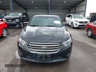 2015 Ford Taurus SEL with VIN 1FAHP2H85FG108575, listed as a IAAI auction lot 42514846 with 209,478 mi miles and . Bid and sale history available at DreamBid. Image 12.