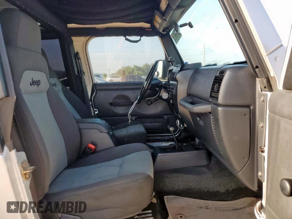 2005 Jeep Wrangler X с VIN 1J4FA39S45P353119, выставлен на аукционе Copart как лот 64206825 с пробегом 134 298 миль миль и Списание • Salvage title. История ставок и продаж доступна на DreamBid. Изображение 7.
