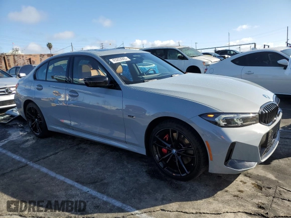 2023 BMW 3 Series 330e with VIN 3MW39FF07P8D26890, listed as a Copart auction lot 45203065 with 21,679 mi miles and Salvage Title. Bid and sale history available at carsss.com. Image 4.