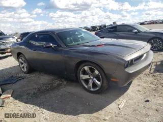 2013 Dodge Challenger R/T with VIN 2C3CDYBT2DH679671, listed as a Copart auction lot 46857245 with 0 mi miles and Salvage Title. Bid and sale history available at carsss.com. Image 4.