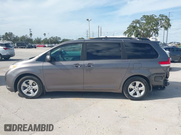 2014 Toyota Sienna LE AAS with VIN 5TDKK3DCXES432611, listed as a IAAI auction lot 40771635 with 214,145 mi miles and . Bid and sale history available at carsss.com. Image 15.