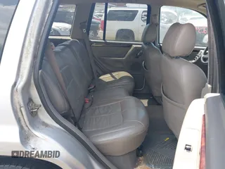 2004 Jeep Grand Cherokee Limited with VIN 1J4GW58N64C283657, listed as a IAAI auction lot 42542150 with 228,910 mi miles and . Bid and sale history available at DreamBid. Image 8.