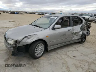 2000 Infiniti G20 Luxury z VIN JNKCP11A8YT309133, wystawiony jako Copart lot #82125374 z przebiegiem Nie podano mil oraz Nie do naprawy • Non repairable. Historia ofert i sprzedaży dostępna na DreamBid. Obrazek 1.