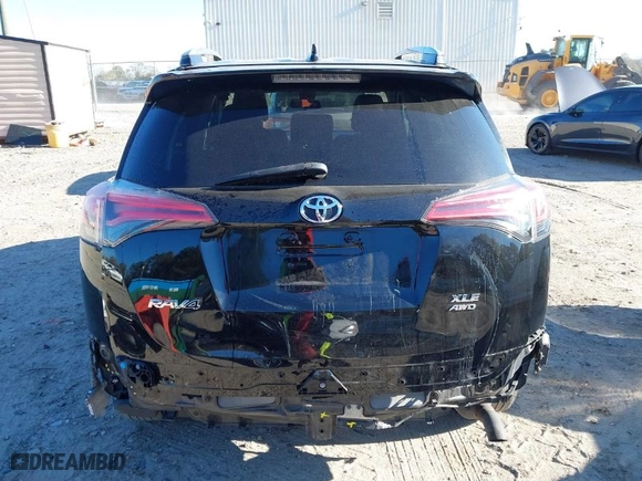 2018 Toyota RAV4 XLE with VIN 2T3RFREV9JW793956, listed as a IAAI auction lot 41012152 with 77,033 mi miles. Bid and sale history available at carsss.com. Image 17.