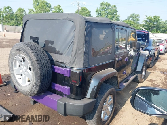 2014 Jeep Wrangler Unlimited Sahara with VIN 1C4BJWEG6EL217945, listed as a IAAI auction lot 42388477 with 61,739 mi miles and . Bid and sale history available at DreamBid. Image 4.