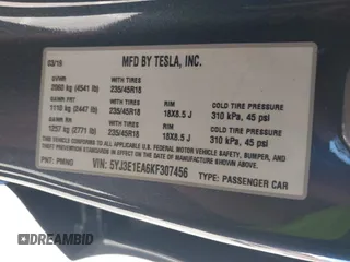 2019 Tesla Model 3 Mid Range with VIN 5YJ3E1EA6KF307456, listed as a IAAI auction lot 41944454 with 99,059 mi miles and . Bid and sale history available at DreamBid. Image 9.