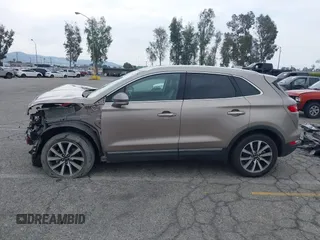 2019 Lincoln MKC Reserve with VIN 5LMCJ3C9XKUL09386, listed as a IAAI auction lot 41857681 with 66,101 mi miles and . Bid and sale history available at DreamBid. Image 15.