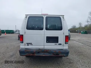 2012 Ford Econoline Cargo Commercial with VIN 1FTNE1EW0CDB10750, listed as a IAAI auction lot 41939696 with 180,042 mi miles. Bid and sale history available at carsss.com. Image 17.