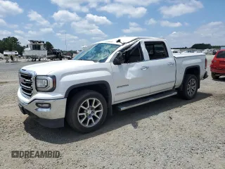 2017 GMC Sierra 1500 SLT with VIN 3GTP1NEC8HG144849, listed as a Copart auction lot 63206585 with 124,243 mi miles and Salvage title. Bid and sale history available at DreamBid. Image 1.