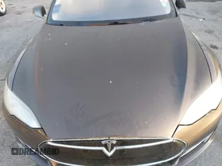 2014 Tesla Model S 60 z VIN 5YJSA1H19EFP51406, wystawiony jako IAAI lot #41561395 z przebiegiem Nie podano mil oraz . Historia ofert i sprzedaży dostępna na DreamBid. Obrazek 10.