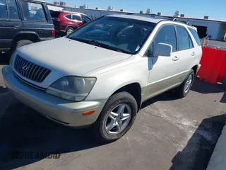 1999 Lexus RX 300 z VIN JT6GF10U9X0015877, wystawiony jako IAAI lot #41666610 z przebiegiem Nie podano mil oraz . Historia ofert i sprzedaży dostępna na DreamBid. Obrazek 2.