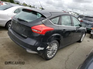 2015 Ford Focus Electric z VIN 1FADP3R41FL232463, wystawiony jako Copart lot #51962274 z przebiegiem 83 379 mil mil oraz . Historia ofert i sprzedaży dostępna na DreamBid. Obrazek 3.