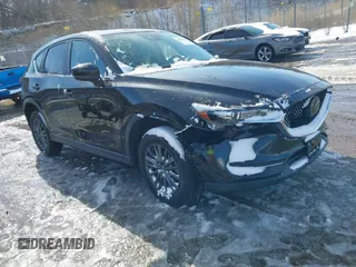 2020 Mazda CX-5 Touring with VIN JM3KFBCM5L0866189, listed as a IAAI auction lot 41829901 with 31,627 mi miles. Bid and sale history available at carsss.com. Image 1.