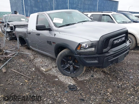 2021 Ram 1500 Classic Warlock with VIN 1C6RR7GT2MS595912, listed as a IAAI auction lot 41733123 with 33,156 mi miles. Bid and sale history available at carsss.com. Image 1.