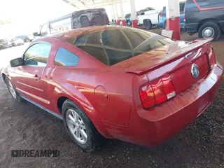 2008 Ford Mustang Deluxe with VIN 1ZVHT80N785179881, listed as a IAAI auction lot 42058845 with 154,385 mi miles. Bid and sale history available at carsss.com. Image 3.