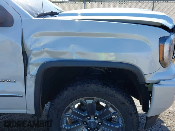 2017 GMC Sierra 1500 Denali with VIN 3GTU2PEJ2HG132769, listed as a IAAI auction lot 41161907 with Not Provided miles and . Bid and sale history available at DreamBid. Image 17.