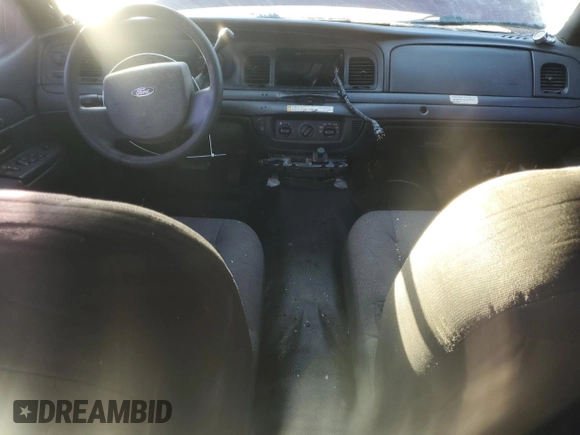 2006 Ford Police Interceptor with VIN 2FAFP71W06X165970, listed as a Copart auction lot 76293344 with 180,661 mi miles and Salvage title. Bid and sale history available at DreamBid. Image 8.