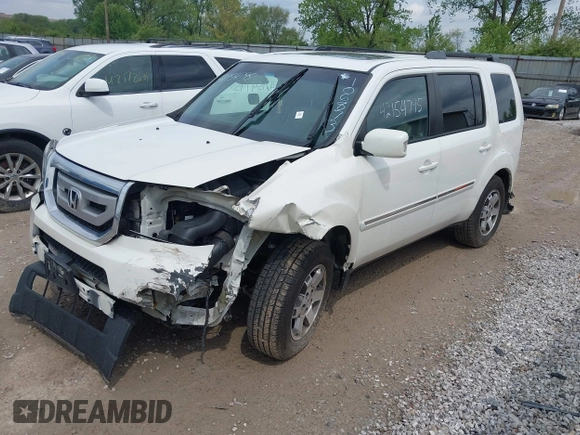 2011 Honda Pilot Touring z VIN 5FNYF4H96BB106873, wystawiony jako IAAI lot #42154795 z przebiegiem 162 282 mil mil oraz . Historia ofert i sprzedaży dostępna na DreamBid. Obrazek 2.