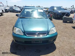 1999 Honda Civic VP with VIN 2HGEJ6611XH540017, listed as a IAAI auction lot 42093222 with 154,261 mi miles. Bid and sale history available at carsss.com. Image 12.