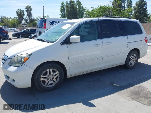 2005 Honda Odyssey EX-L with VIN 5FNRL38605B045246, listed as a IAAI auction lot 42183883 with 164,072 mi miles and . Bid and sale history available at carsss.com. Image 2.