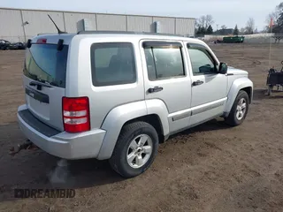 2012 Jeep Liberty Sport with VIN 1C4PJMAKXCW133658, listed as a IAAI auction lot 41814977 with 128,328 mi miles and . Bid and sale history available at carsss.com. Image 4.