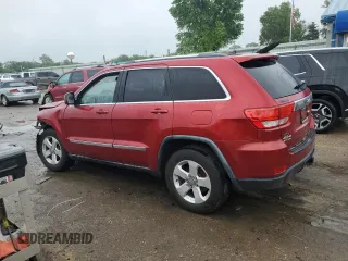 2011 Jeep Grand Cherokee Laredo with VIN 1J4RR4GG4BC569808, listed as a Copart auction lot 56040105 with 167,067 mi miles and Salvage title. Bid and sale history available at DreamBid. Image 2.
