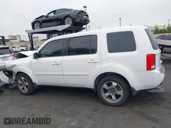 2015 Honda Pilot SE z VIN 5FNYF3H31FB005140, wystawiony jako IAAI lot #42081541 z przebiegiem 182 557 mil mil oraz . Historia ofert i sprzedaży dostępna na DreamBid. Obrazek 14.