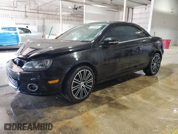 2014 Volkswagen Eos Komfort with VIN WVWBW8AH8EV000316, listed as a Copart auction lot 52208485 with 124,338 mi miles and Salvage Title. Bid and sale history available at DreamBid. Image 1.