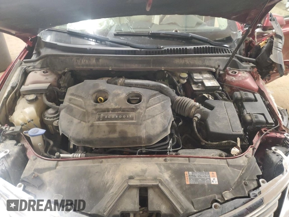 2015 Lincoln MKZ z VIN 3LN6L2J92FR624638, wystawiony jako Copart lot #57158245 z przebiegiem 150 045 mil mil oraz Szkoda całkowita • Salvage title. Historia ofert i sprzedaży dostępna na DreamBid. Obrazek 11.