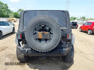 2015 Jeep Wrangler Freedom Edition с VIN 1C4AJWAG0FL520027, выставлен на аукционе IAAI как лот 42585222 с пробегом 78 980 миль миль и . История ставок и продаж доступна на DreamBid. Изображение 16.