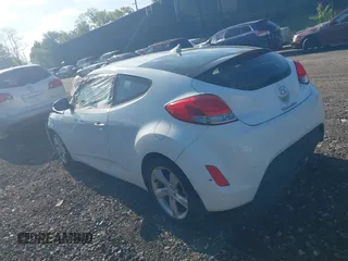 2013 Hyundai Veloster w/Gray Int with VIN KMHTC6AD2DU115735, listed as a IAAI auction lot 39404347 with 166,840 mi miles and . Bid and sale history available at DreamBid. Image 3.