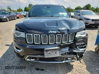 2017 Jeep Grand Cherokee Overland z VIN 1C4RJFCG4HC818132, wystawiony jako Copart lot #62642775 z przebiegiem 116 815 mil mil oraz Szkoda całkowita • Salvage title. Historia ofert i sprzedaży dostępna na DreamBid. Obrazek 5.