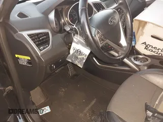 2016 Hyundai Veloster z VIN KMHTC6AD8GU251095, wystawiony jako IAAI lot #41598280 z przebiegiem 119 099 mil mil oraz . Historia ofert i sprzedaży dostępna na DreamBid. Obrazek 13.