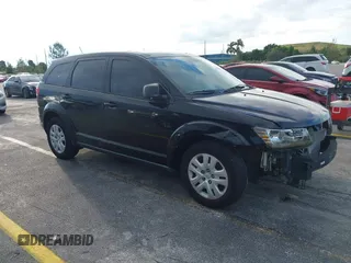 2015 Dodge Journey American Value z VIN 3C4PDCAB8FT592375, wystawiony jako IAAI lot #40505178 z przebiegiem 126 997 mil mil oraz . Historia ofert i sprzedaży dostępna na DreamBid. Obrazek 1.