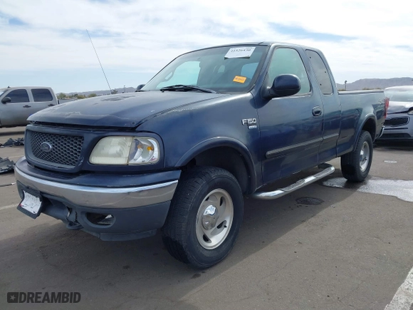2000 Ford F-150 XL with VIN 1FTRX18L2YKA10388, listed as a IAAI auction lot 41526430 with 144,480 mi miles. Bid and sale history available at carsss.com. Image 17.