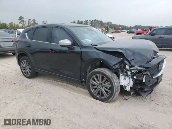 2024 Mazda CX-5 2.5 Turbo Signature with VIN JM3KFBXYXR0366308, listed as a Copart auction lot 83253424 with 8,741 mi miles and Salvage Title. Bid and sale history available at carsss.com. Image 4.