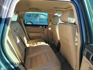 2004 Volkswagen Touareg z VIN WVGEM77L64D051760, wystawiony jako Copart lot #87044304 z przebiegiem Nie podano mil oraz Szkoda całkowita • Salvage title. Historia ofert i sprzedaży dostępna na DreamBid. Obrazek 11.