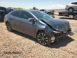 2018 Toyota Corolla L z VIN 2T1BURHE6JC112701, wystawiony jako Copart lot #55699555 z przebiegiem 54 823 mil mil oraz Szkoda całkowita • Salvage title. Historia ofert i sprzedaży dostępna na DreamBid. Obrazek 4.