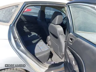 2013 Ford Fiesta SE z VIN 3FADP4BJ7DM165174, wystawiony jako IAAI lot #42311167 z przebiegiem 90 592 mil mil oraz . Historia ofert i sprzedaży dostępna na DreamBid. Obrazek 8.
