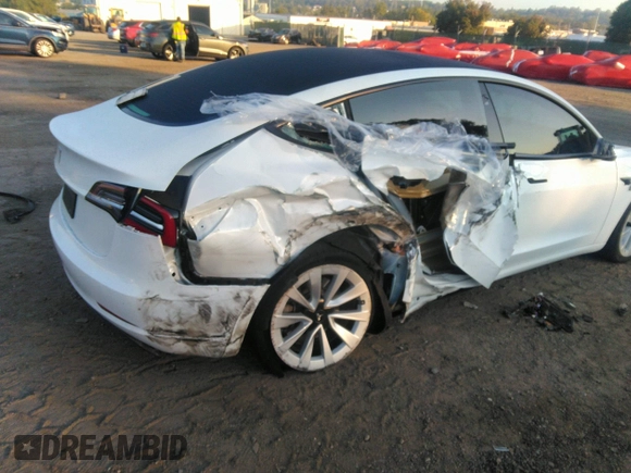 2023 Tesla Model 3 z VIN 5YJ3E1EA3PF449187, wystawiony jako IAAI lot #40320939 z przebiegiem Nie podano mil oraz . Historia ofert i sprzedaży dostępna na DreamBid. Obrazek 5.