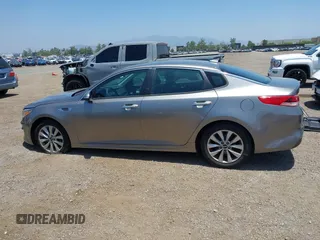 2018 Kia Optima LX with VIN 5XXGT4L34JG266575, listed as a IAAI auction lot 42458844 with 73,394 mi miles and . Bid and sale history available at DreamBid. Image 14.
